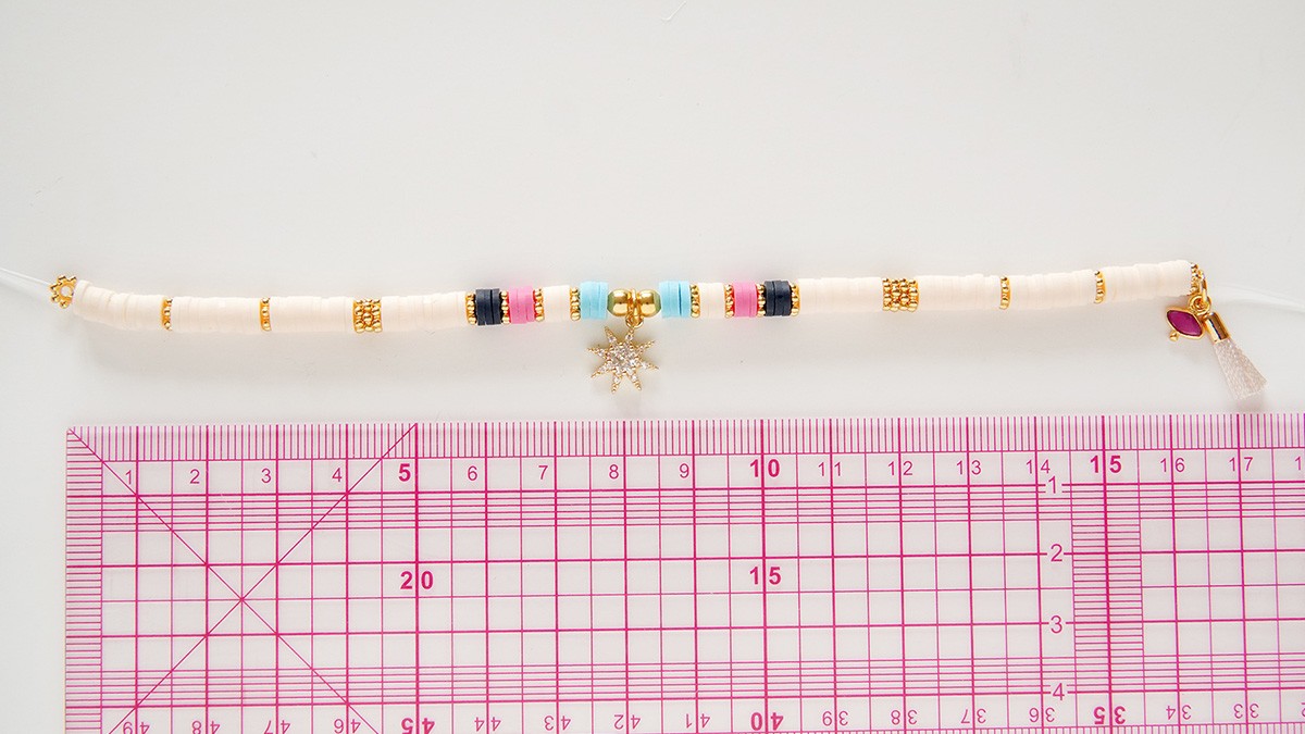 Assortment of bracelets with heishi and gold charms : Step 8