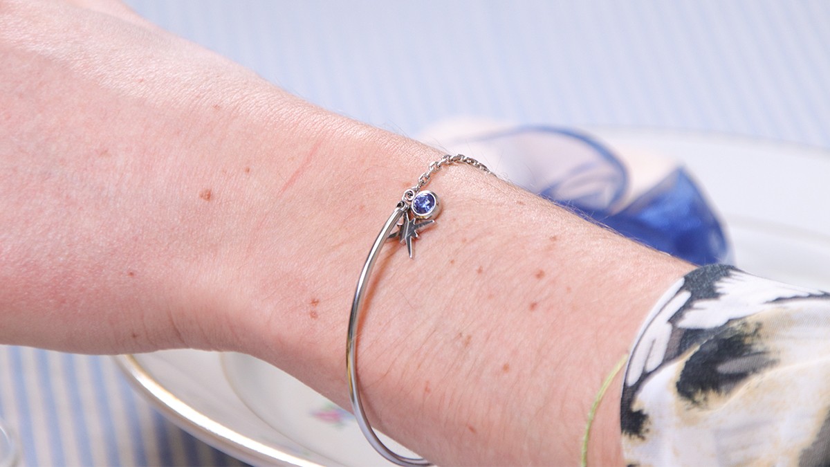 Schema  Customizable stainless steel half-rimmed bracelet with charms