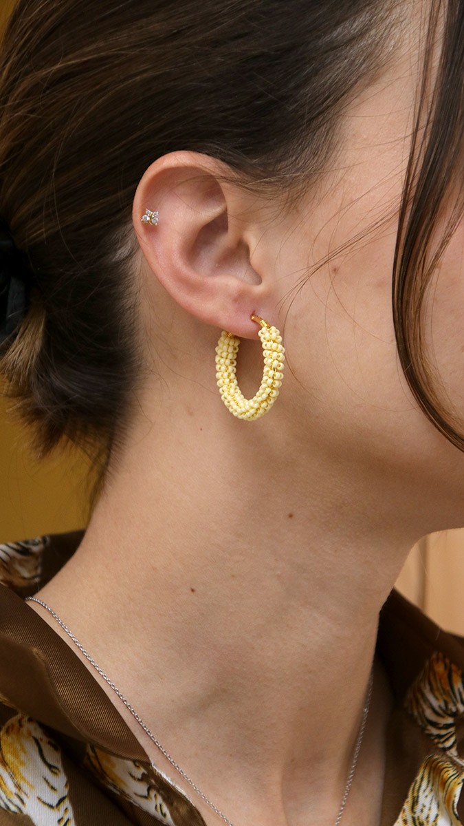 Schema  Colorful creoles with seed beads wrapped around them