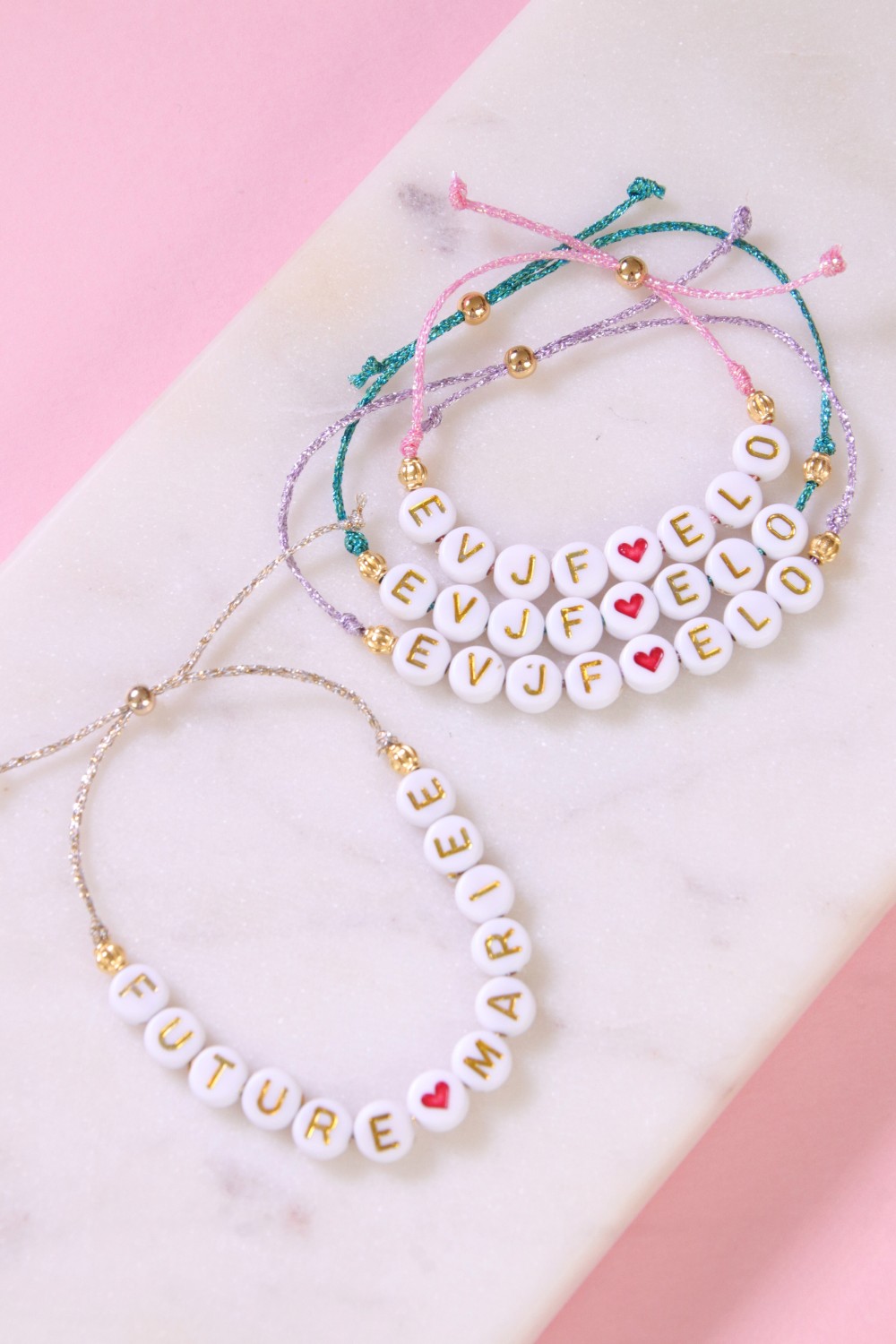 Bachelorette party bracelets with metallic thread and letter beads