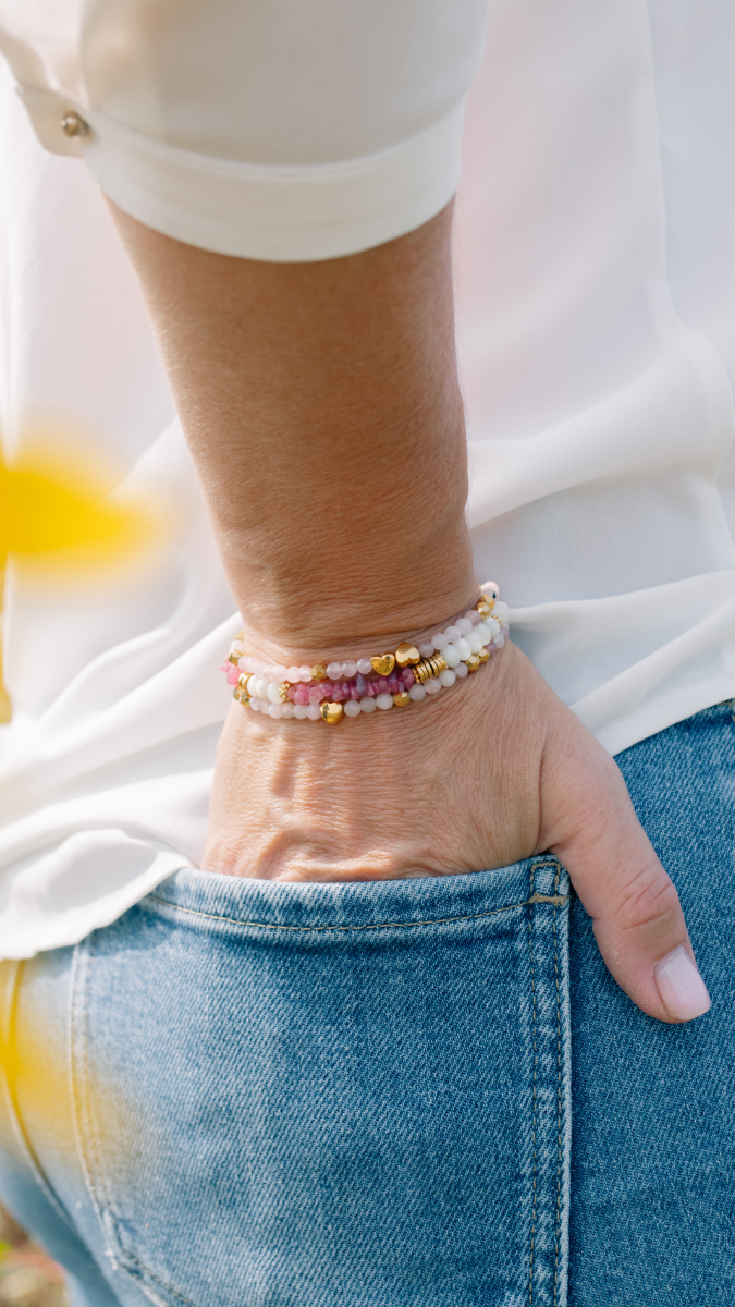 Thin bracelets in natural pink stone