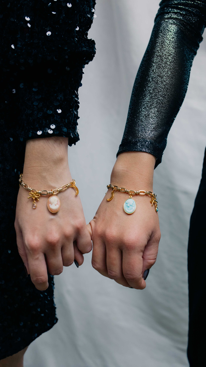 Schema  Vintage gold mesh bracelet with charms