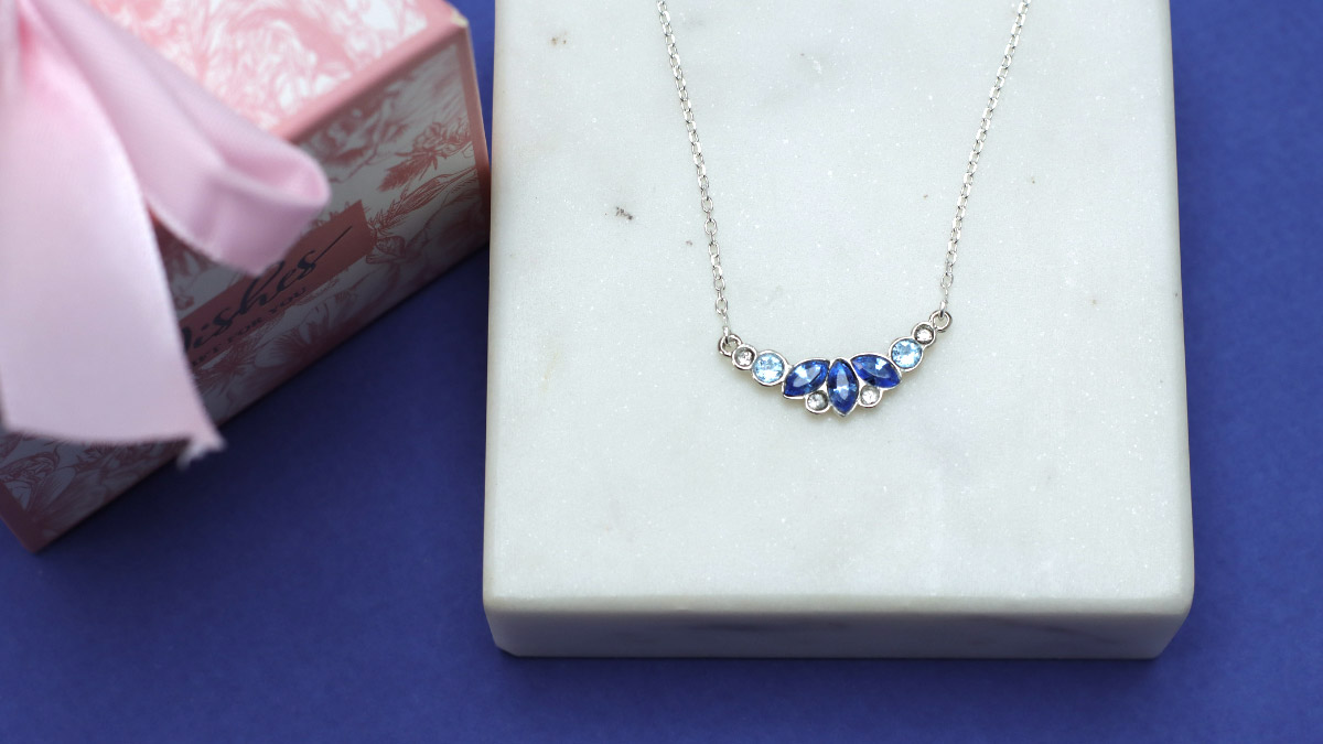 Silver necklace with blue crystals