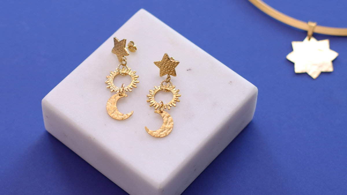 Gold Tone stainless steel earrings with sun and moon star motif