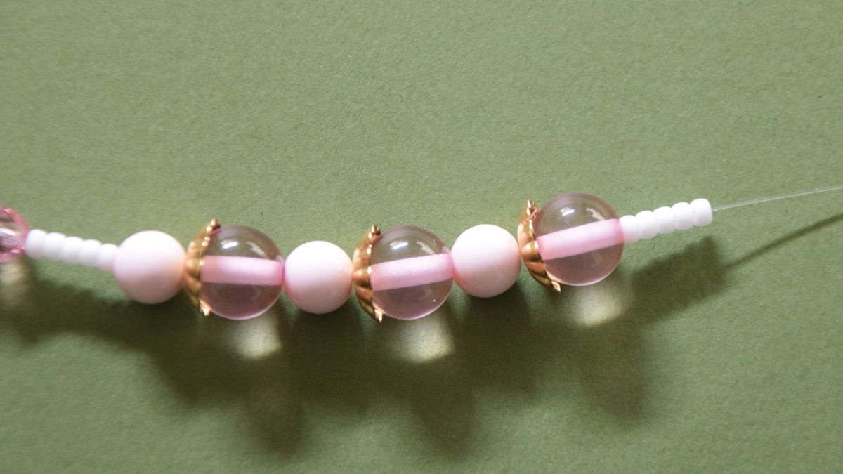 Pink bracelet with resin beads and flower charm : Step 9