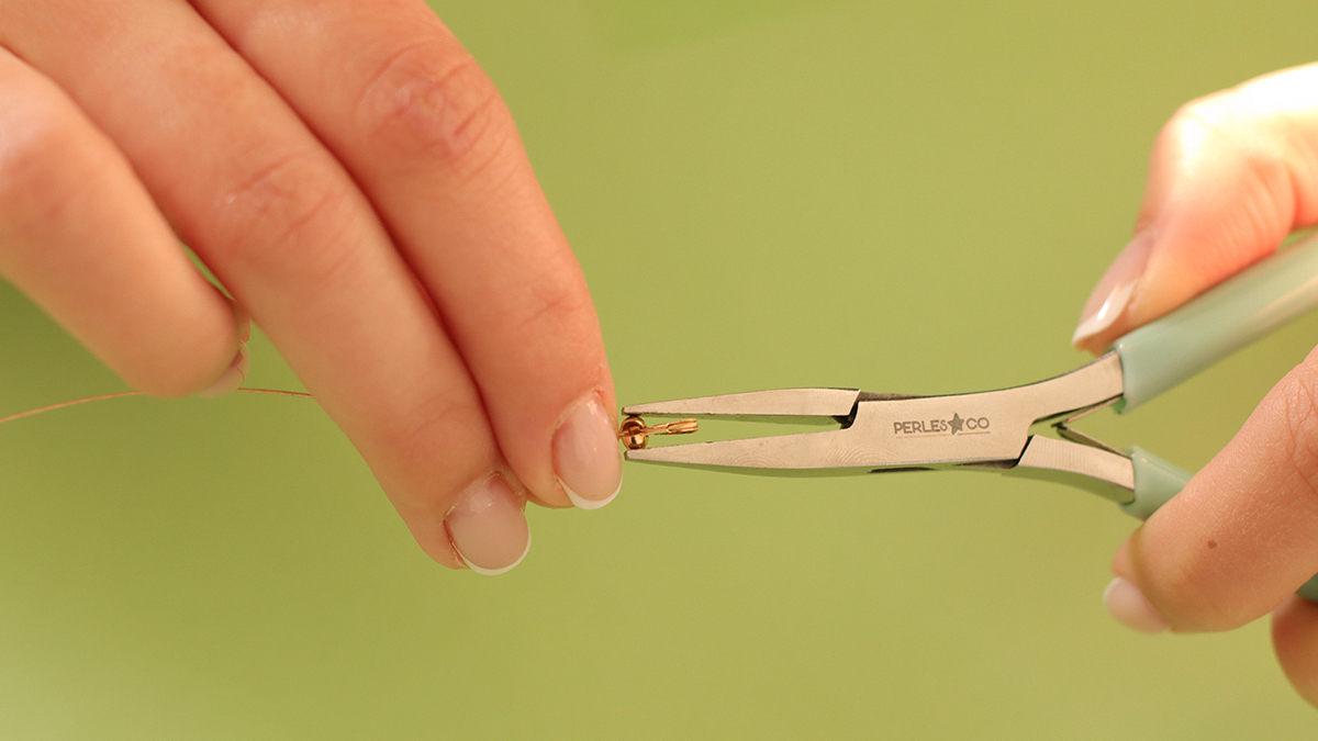 Pink and green necklaces with butterfly pendant and flower beads : Step 2