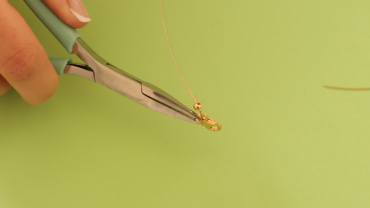 Pink and green necklaces with butterfly pendant and flower beads : Step 3