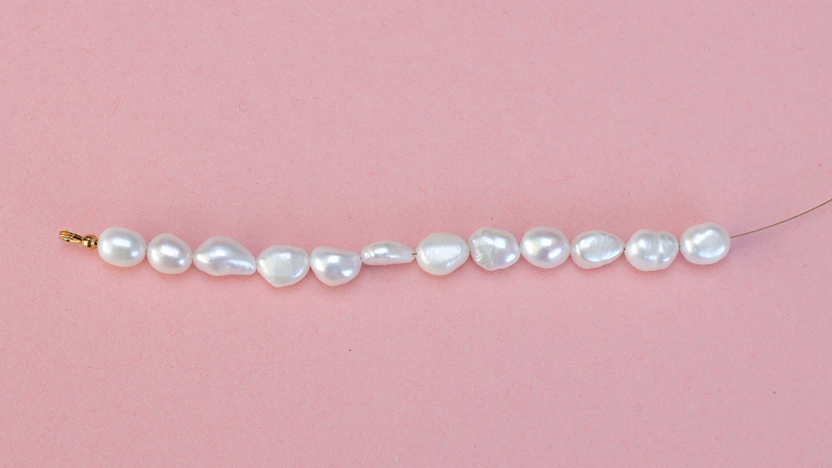 Freshwater pearl necklace with red charms : Step 3