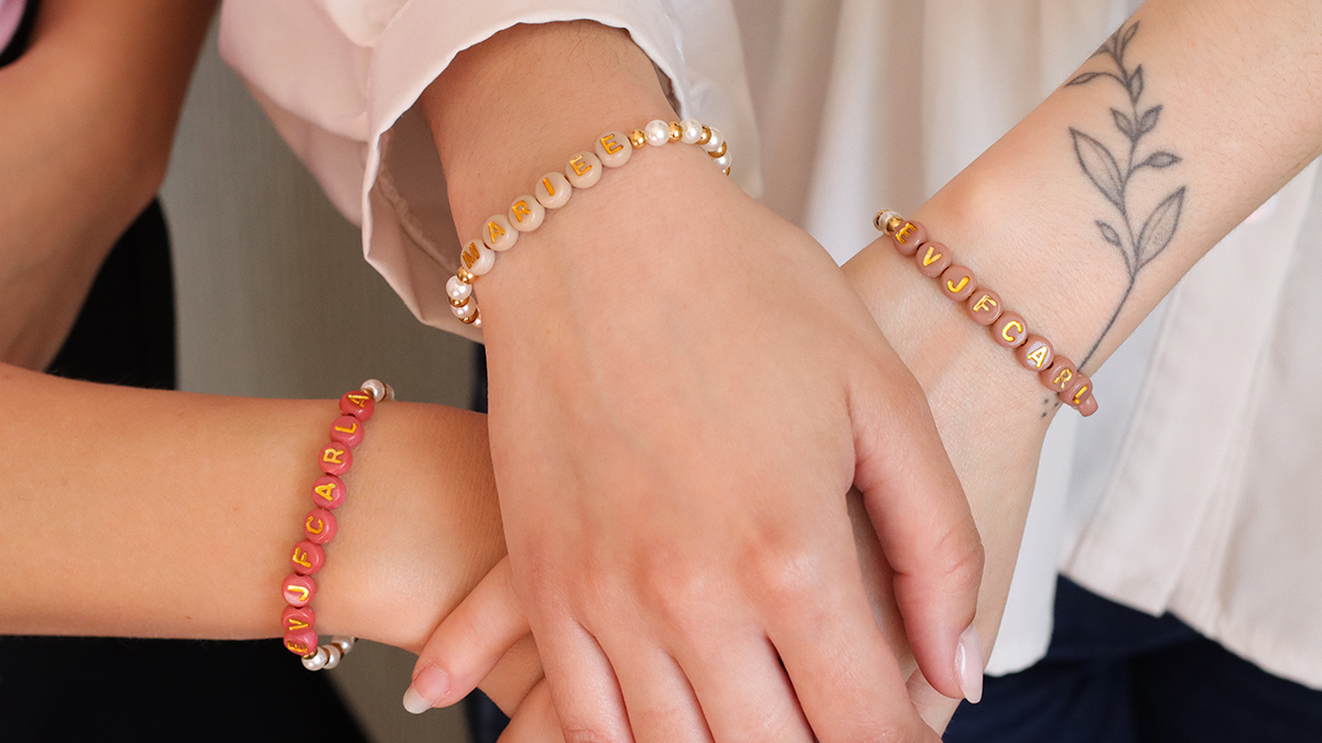 Schema EVE bracelets with pearly beads and letter beads Schema EVE bracelets with pearly beads and letter beads