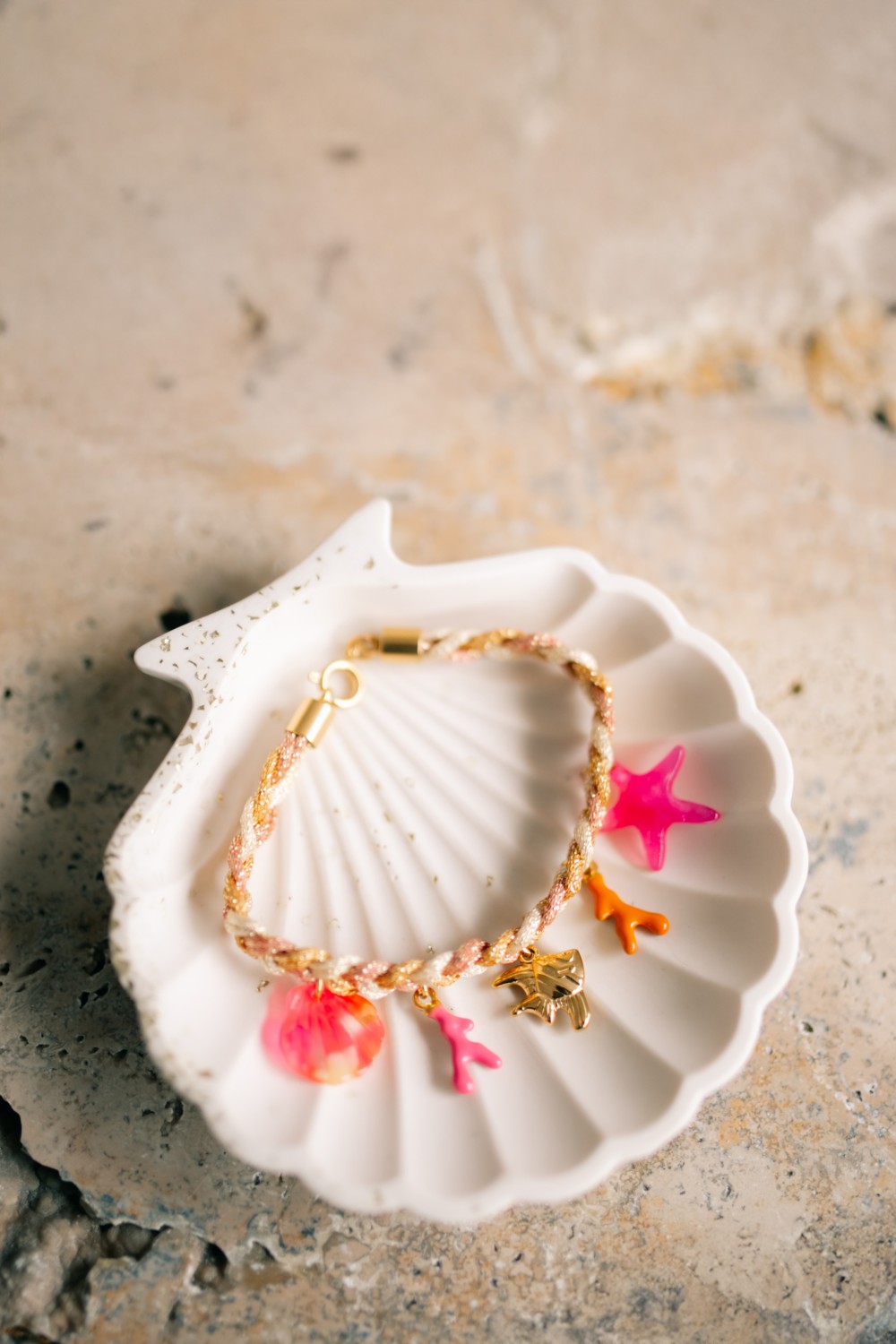 Women's braided bracelet with charms