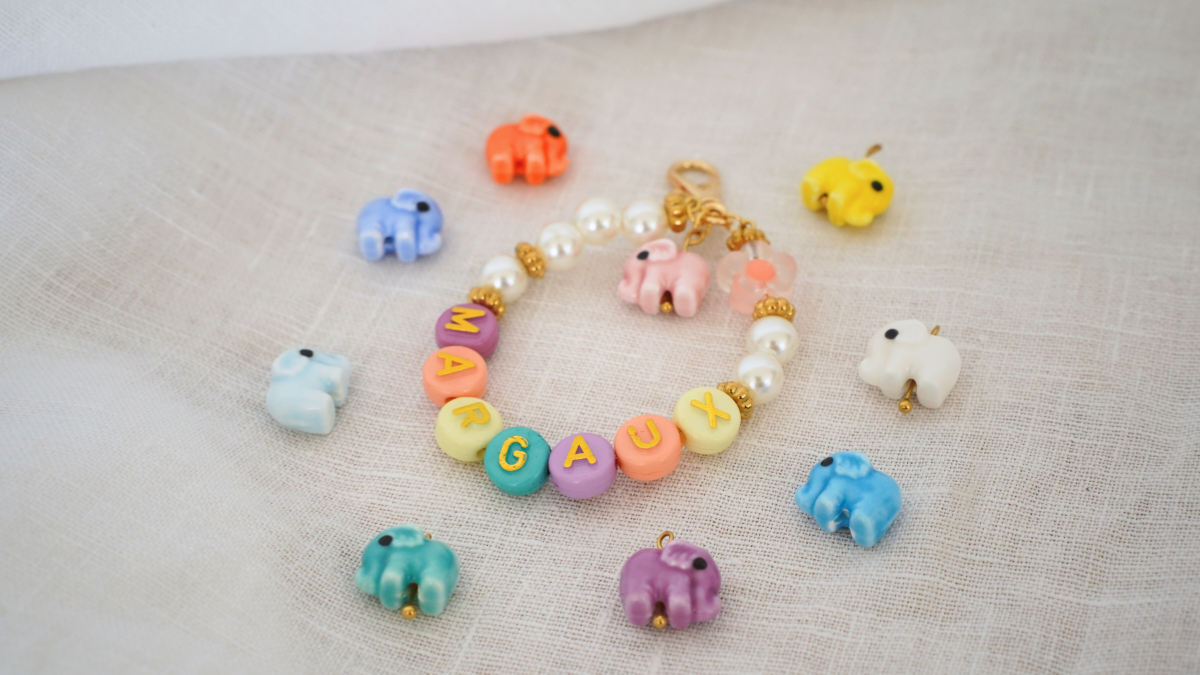 Schema Personalized key ring with beads and letters Schema Personalized key ring with beads and letters