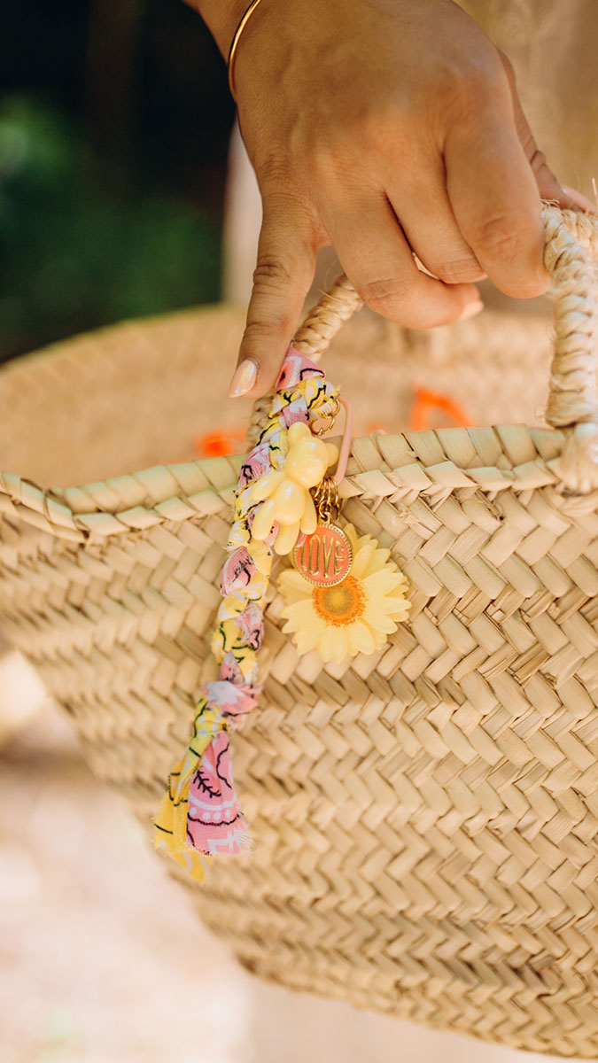 Colorful bag grigri with bandana and charms
