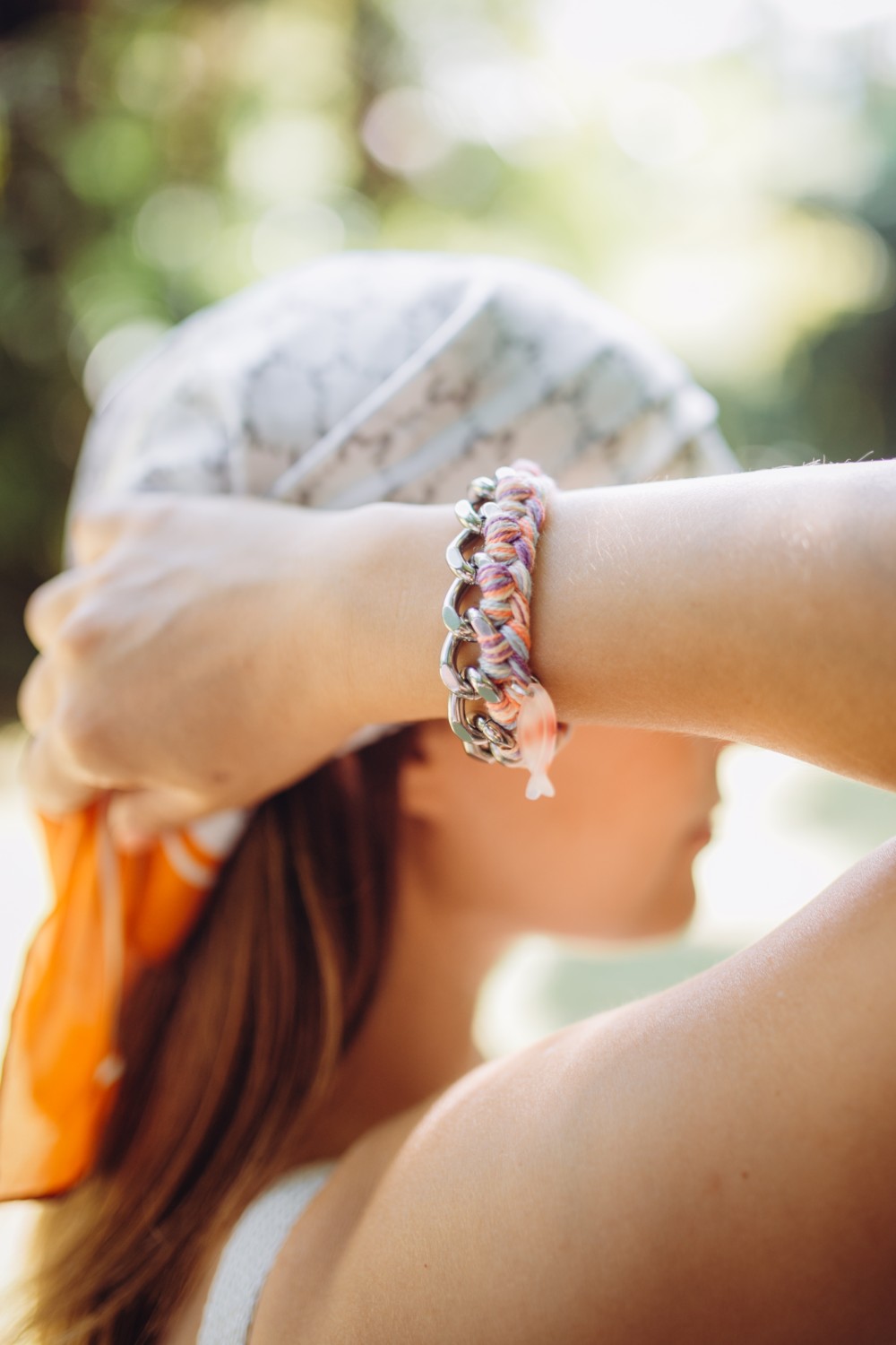 Schema Bracelet in stainless steel and braided pastel cotton thread Schema Bracelet in stainless steel and braided pastel cotton thread