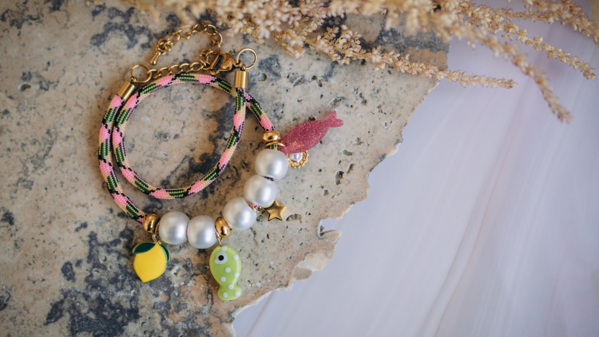 Schema  Paracord bracelet with stainless steel charms