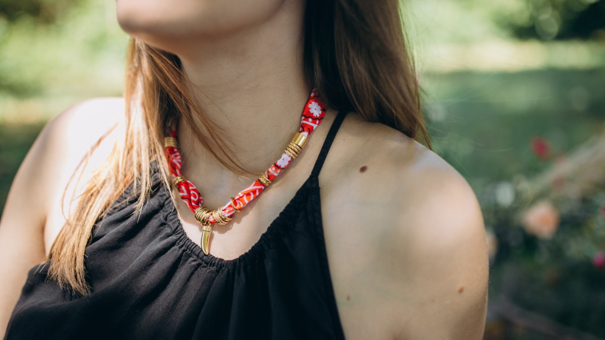 Schema  Orange bandana necklace with worked beads