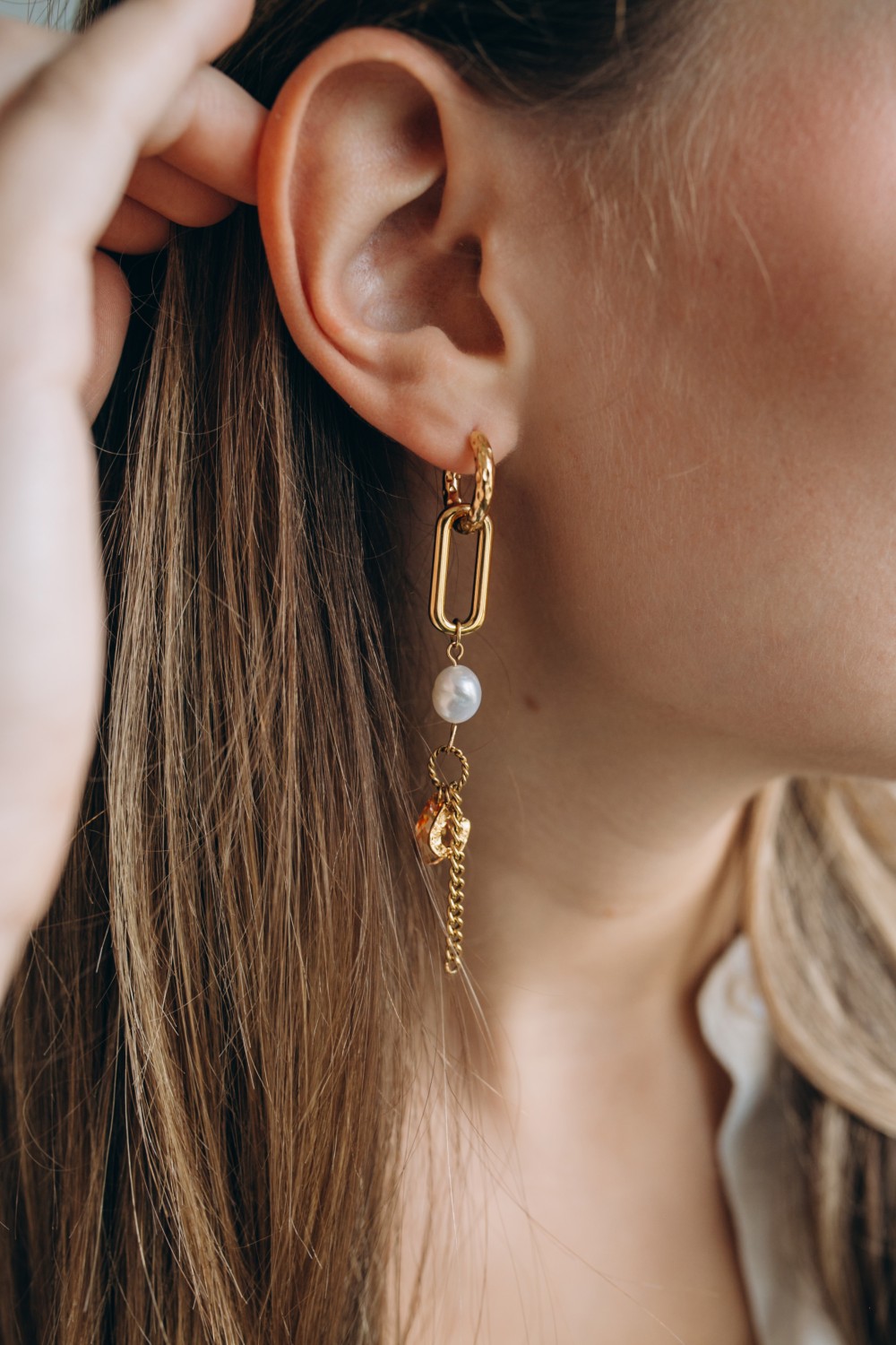 Lucky asymmetrical dangling earrings