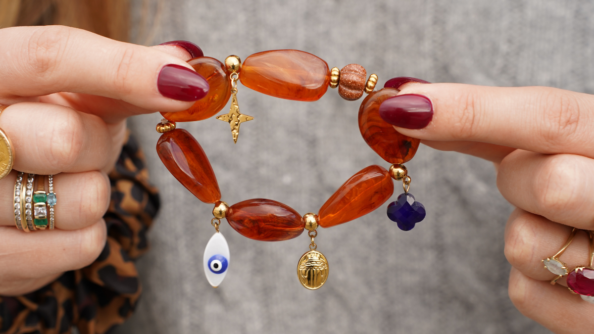 Schema  Resin beads and stainless steel charms bracelet