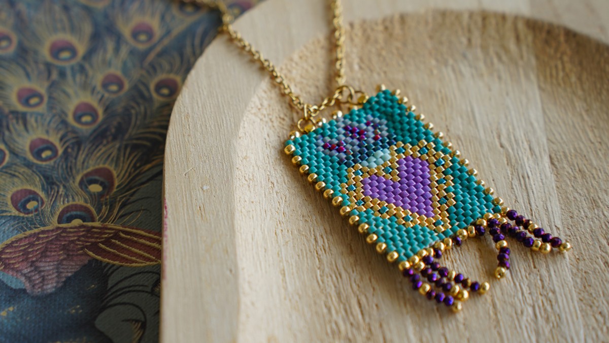 Woven pendant with ex-voto heart