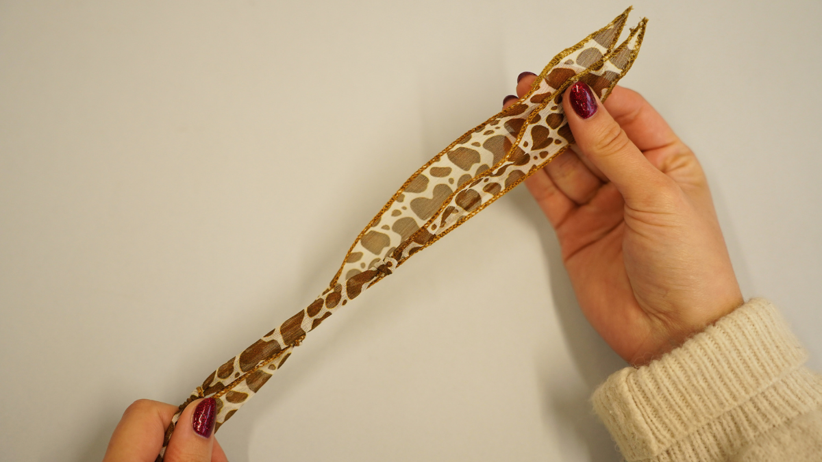 Cow pattern silk ribbon with gold charms : Step 1 Cow pattern silk ribbon with gold charms : Step 1