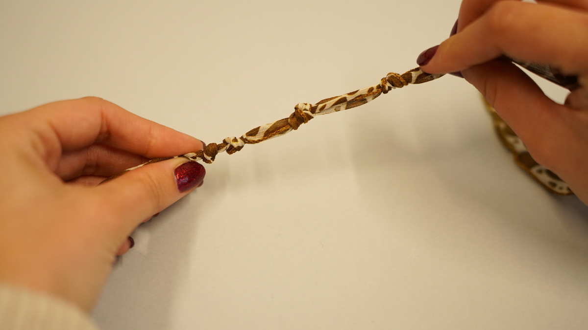 Cow pattern silk ribbon with gold charms : Step 2 Cow pattern silk ribbon with gold charms : Step 2