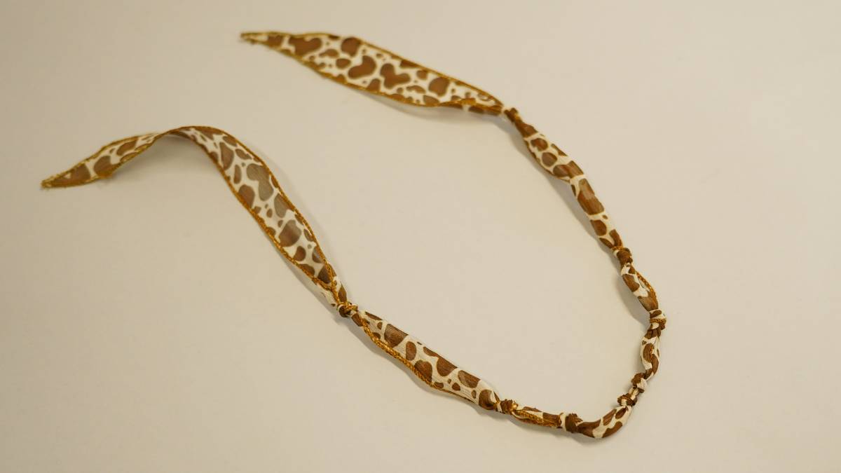 Cow pattern silk ribbon with gold charms : Step 3 Cow pattern silk ribbon with gold charms : Step 3