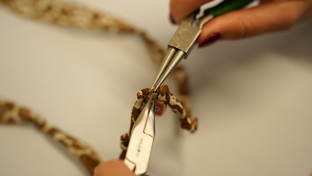 Cow pattern silk ribbon with gold charms : Step 4 Cow pattern silk ribbon with gold charms : Step 4