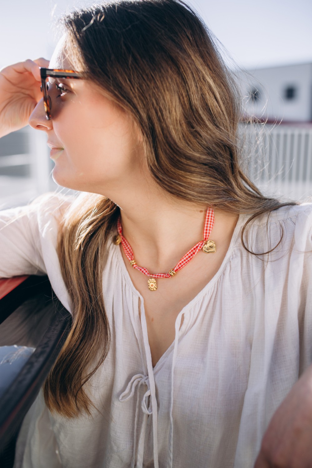 Schema  Gingham ribbon necklace with heart charms