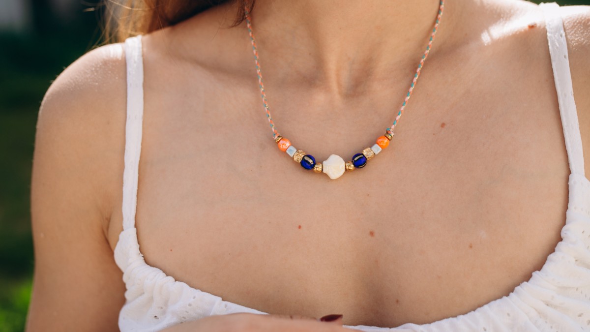 Cord necklace with multicolored beads