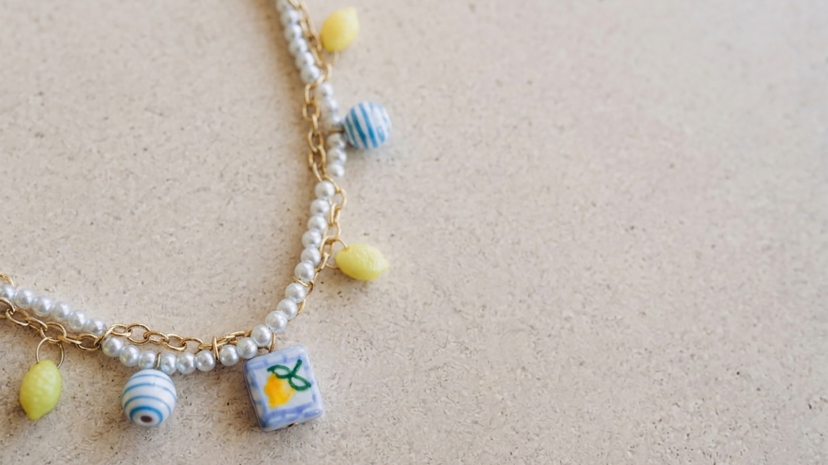 Schema Stainless steel necklace with imitation pearls and ceramic beads Schema Stainless steel necklace with imitation pearls and ceramic beads