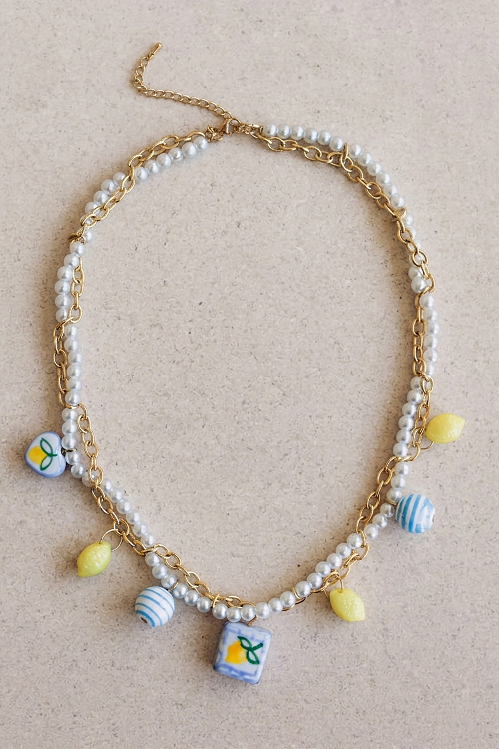 Stainless steel necklace with imitation pearls and ceramic beads