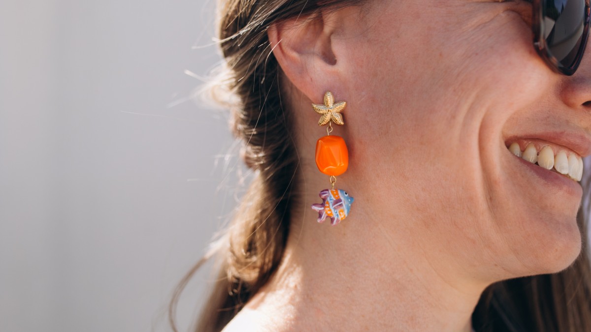 Schema  Starfish and fish pendant earrings