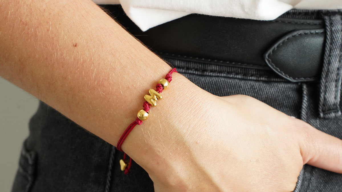 Cord bracelet with stainless steel letter Cord bracelet with stainless steel letter