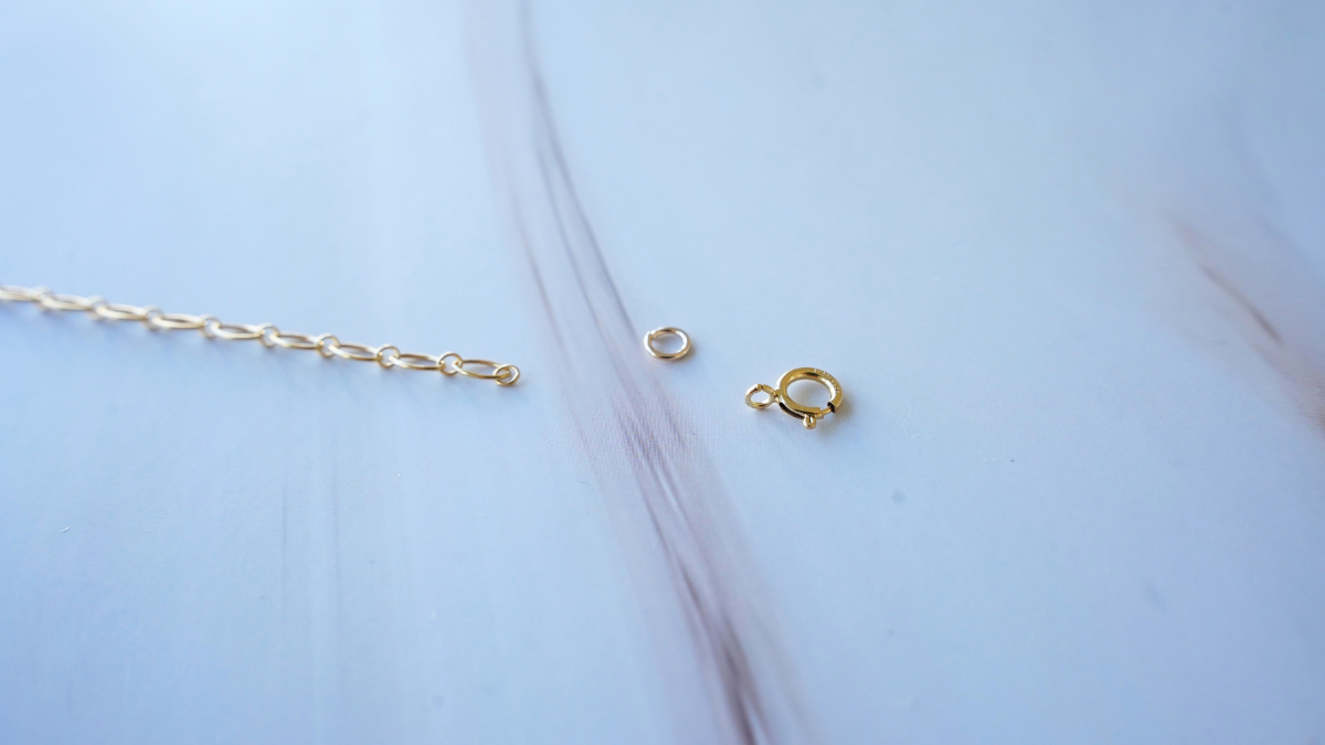 Gold Filled necklace with a chain, bead clusters, and a heart-shaped ring : Step 2 Gold Filled necklace with a chain, bead clusters, and a heart-shaped ring : Step 2