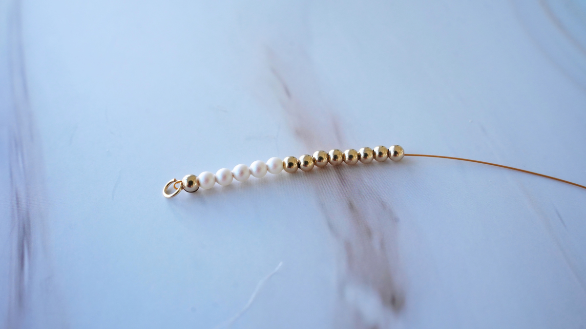 Gold Filled necklace with a chain, bead clusters, and a heart-shaped ring : Step 4 Gold Filled necklace with a chain, bead clusters, and a heart-shaped ring : Step 4