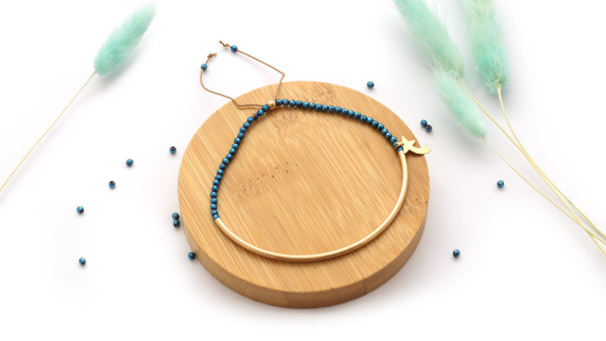 Gold filled half-ring bracelet with blue hematites and shooting star